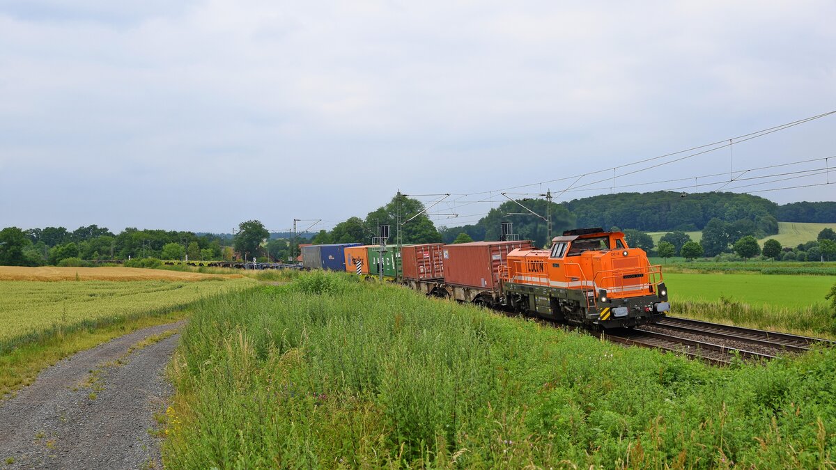 BRLL 4185 030, vermietet an LOCON (323), mit schwach ausgelastetem Containerzug DGS 68735 Bremen-Grolland - Bönen (Vehrte, 02.07.2021).