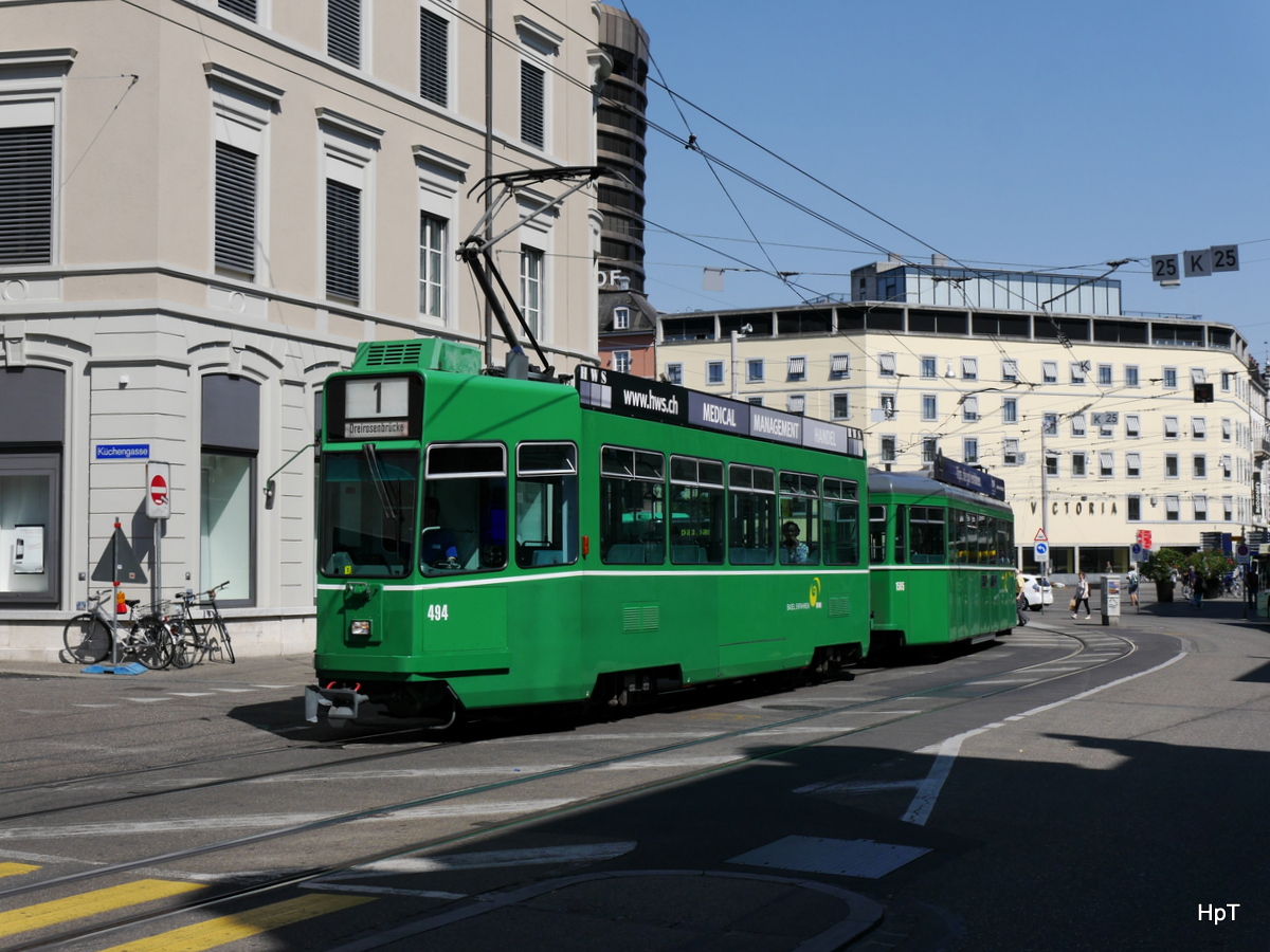 BVB - Tram Be 4/4 494 mit 2 Beiwagen unterwegs auf der Linie 1 vor dem SBB Bahnhof in Basel am 11.07.2015