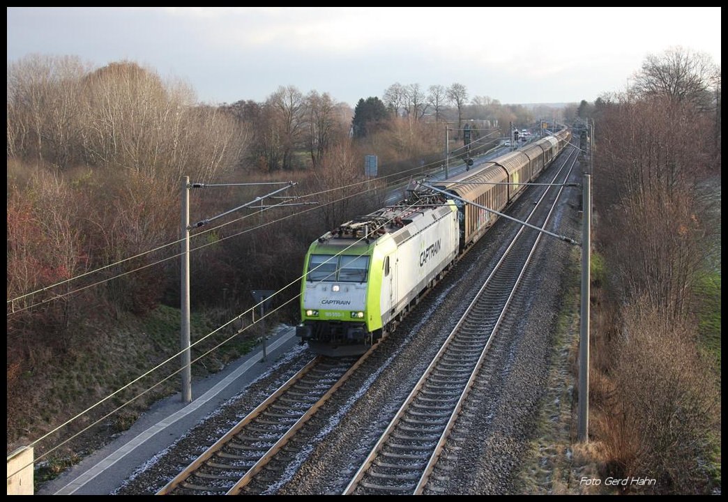 Captrain 185550 mit einem Güterzug in Hasbergen in Richtung Münster am 30.11.2016 um 9.22 Uhr.