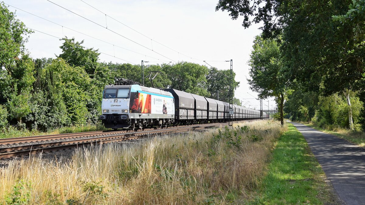 Captrain Deutschland 185 549  MANNESMANN RÖHRENWERK , vermietet an CCW,  mit Kokszug DGS 89241 Bottrop Süd - Bremen Stahlwerke (bei Lembruch, 28.07.2022).