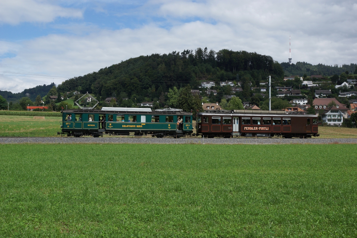 CFe 4/4 11 und Bre 4/4 1 befinden sich am 25.08.2013 bei Stettlen.