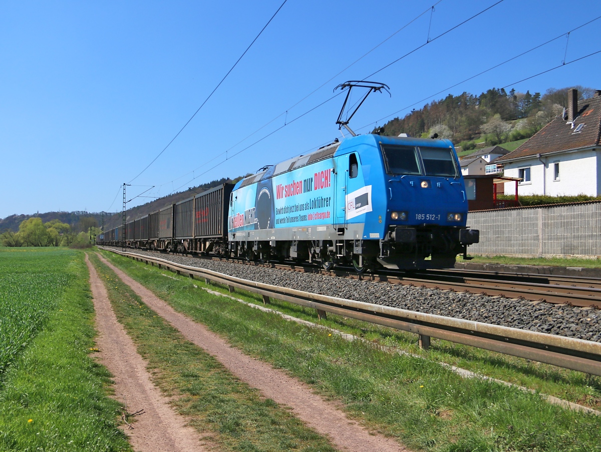 CFL 185 512  Wir beißen nicht  mit Containerzug in Fahrtrichtung Norden. Aufgenommen in Ludwigsau-Friedlos am 19.04.2019.