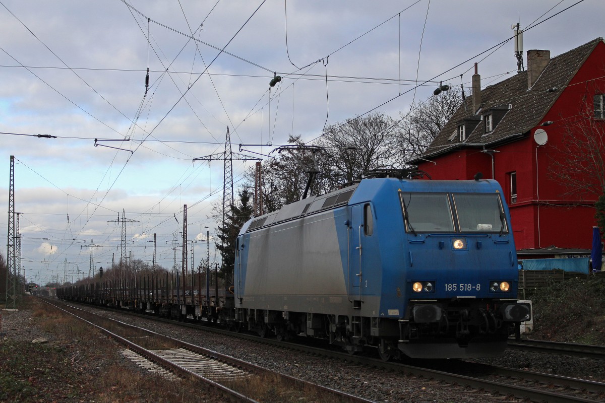 CFL Cargo 185 518 am 16.1.14 mit einem Stahlzug in Ratingen-Lintorf.