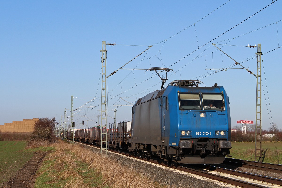 CFL Cargo Mietlok 185 512 am 2.2.14 mit einem Stahlzug in Neuss-Allerheiligen.