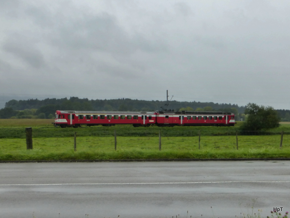 CJ - Triebwagen RBDe 4/4 566 222-6 mit dem Steuerwagen Bt 50 85 80-35 922-4 unterwegs bei Alle am 31.08.2014