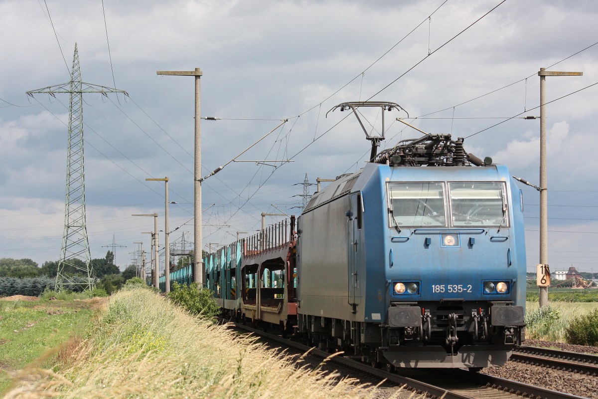 Crossrail 185 535 am 22.6.13 mit einem leeren Autozug bei Br�hl.