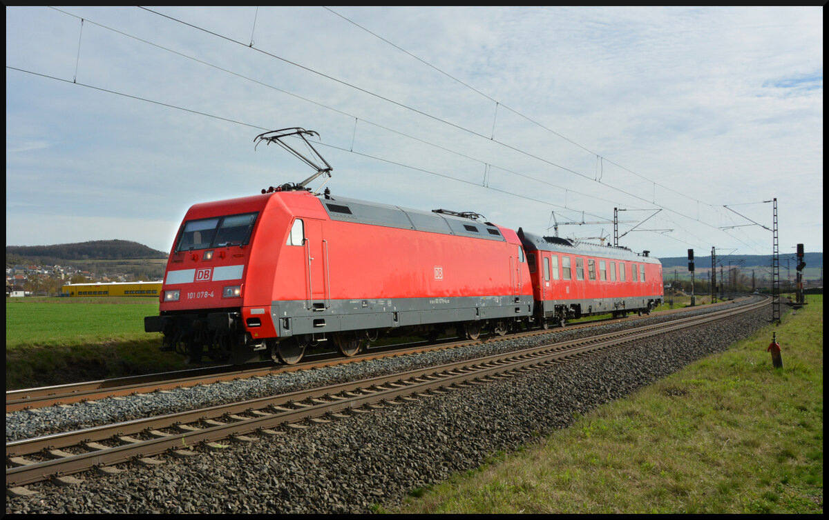 DB 101 078-4 kam am 14.03.2024 mit dem roten Messwagen 63 80 99-92 005-7 Dienstm³¹² auf dem Weg von München nach Minden(Westfalen) bei Retzbach im Maintal um die Kurve.