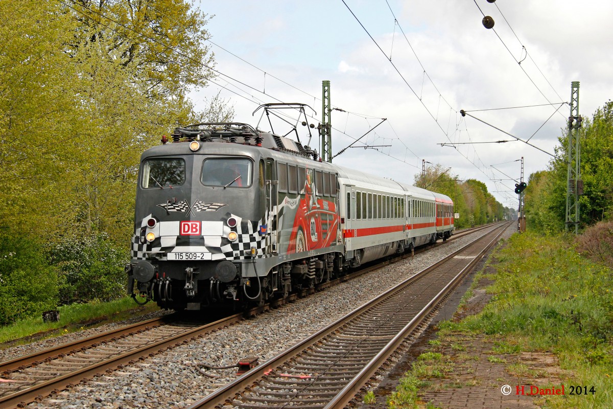 DB 115 509-2  80 Jahre Autozug  mit Pbz 2491 in Kamen Methler, April 2014.