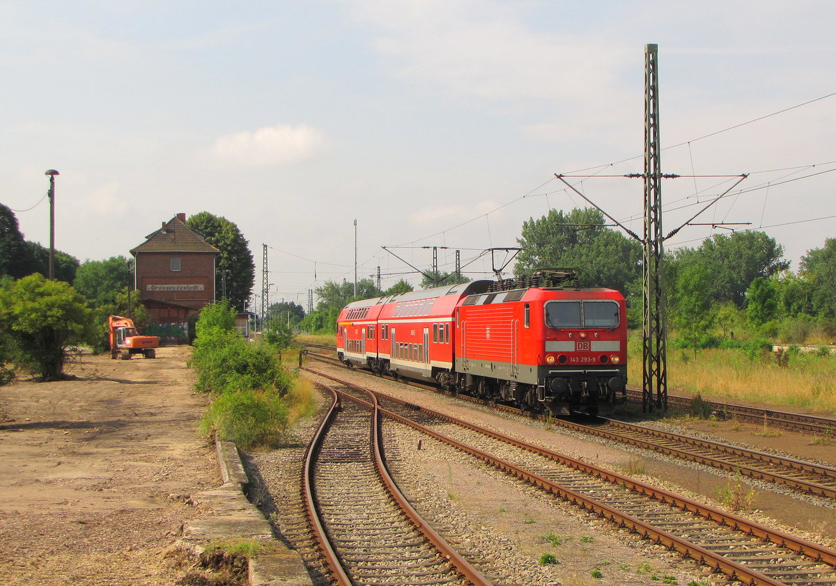DB 143 293-9 mit der RB 16364 von Erfurt Hbf nach Sangerhausen, am 11.07.2014 in Großrudestedt.