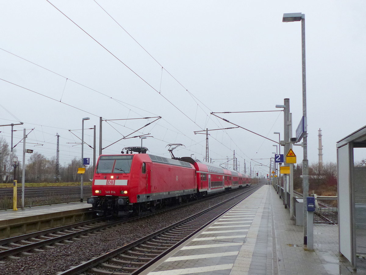 DB 146 014 mit dem RE 16523  Saxonia  von Leipzig Hbf nach Dresden Hbf, am 01.02.2020 in Leipzig-Engelsdorf.