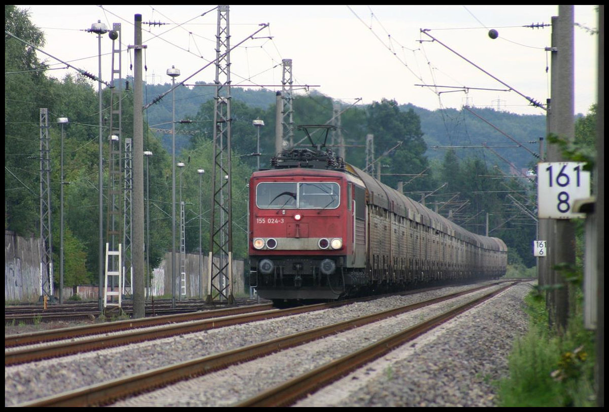 DB 155024-3 fährt hier mit einem Ganzzug aus Osnabrück kommend am 23.7.2007 durch Ibbenbüren Esch.