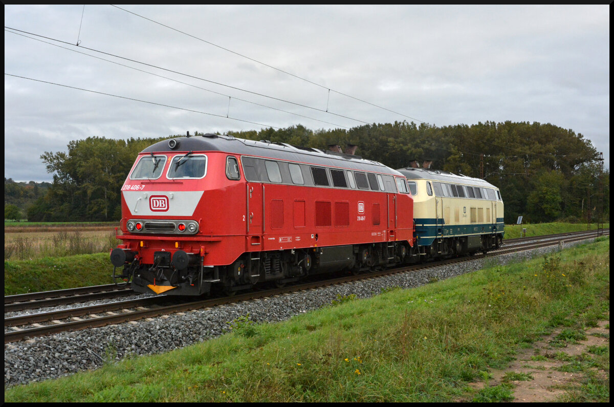 DB 218 446 & 406 sind am 03.10.2024 auf dem Weg von Kempten nach Niebüll, hier bei Retzbach im Maintal.