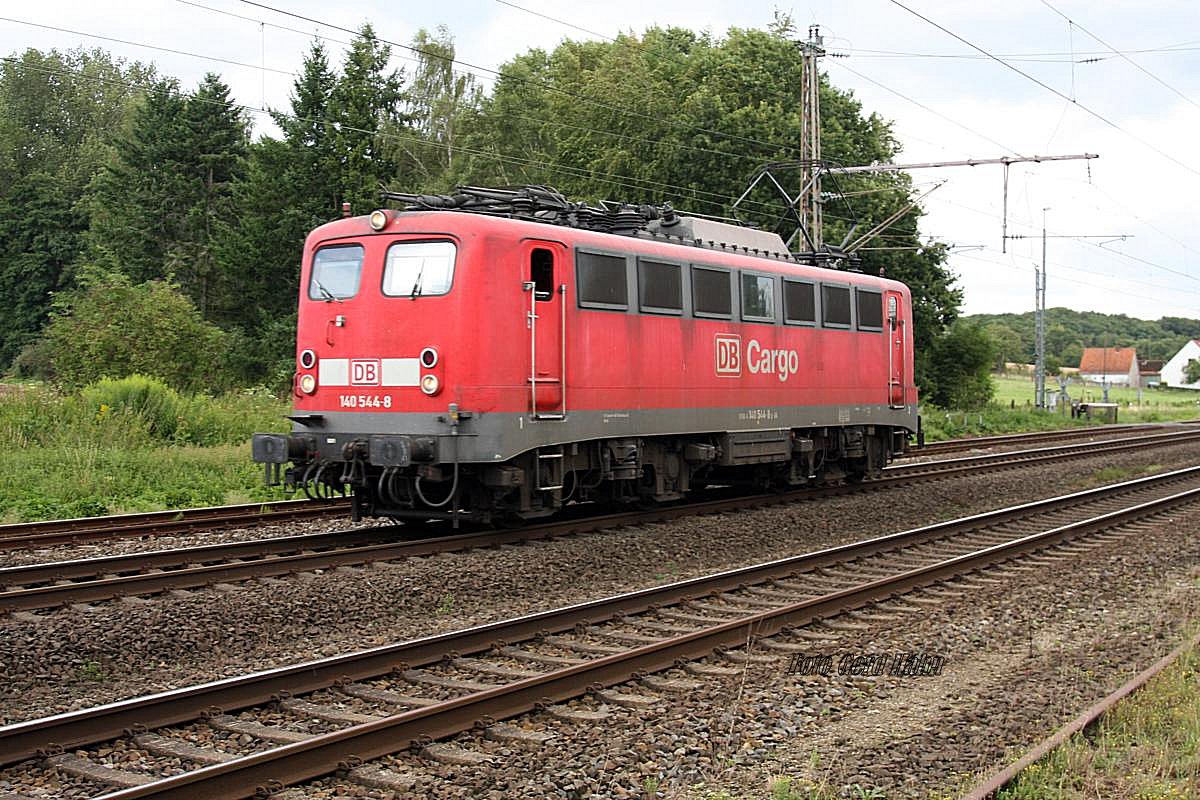 DB Cargo 140544 solo am 11.8.20^14 um 16.20 Uhr durch Westerkappeln - Velpe Richtung Rheine fahrend.