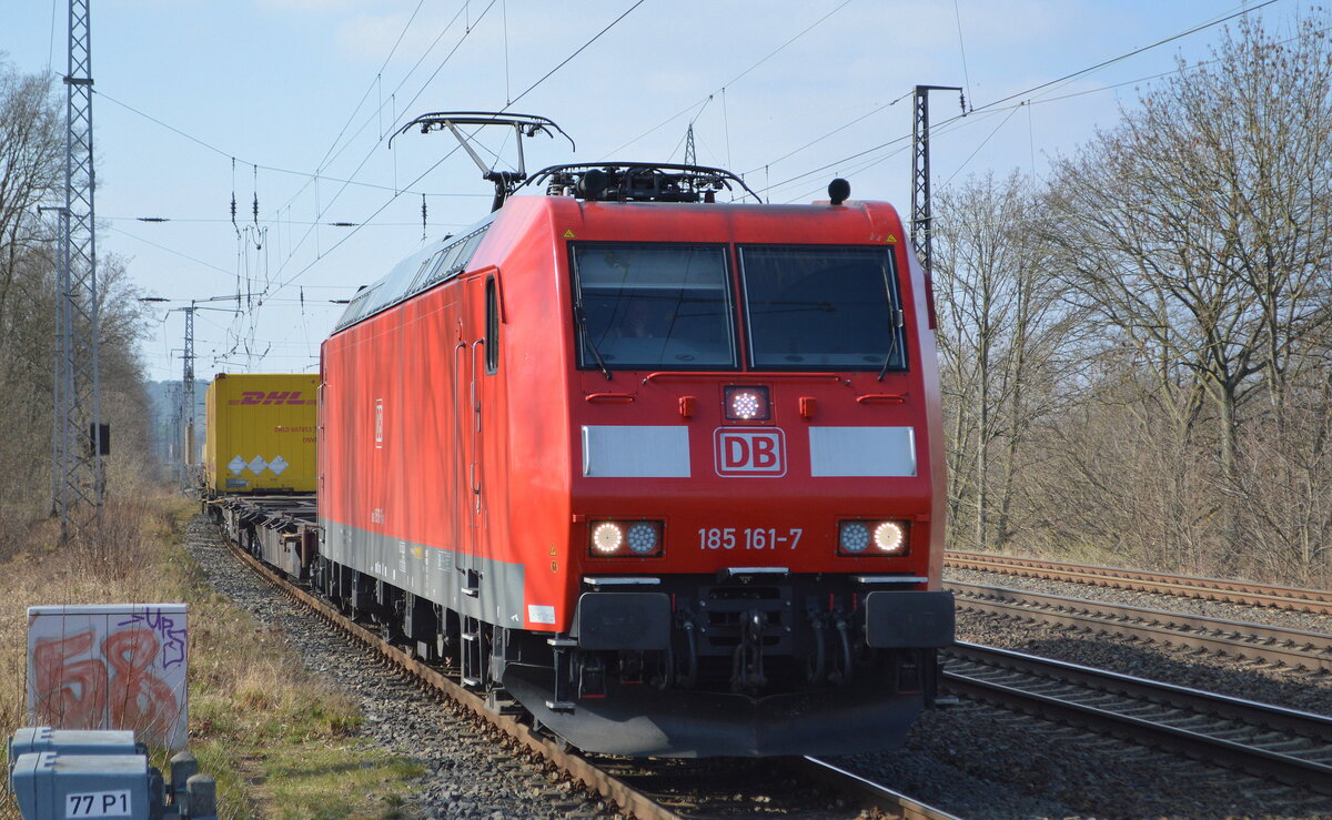 DB Cargo AG [D]  185 161-7  [NVR-Nummer: 91 80 6185 161-7 D-DB] mit Containerzug Richtung Terminal Großbeeren am 10.03.22 Durchfahrt Bf. Saarmund. 