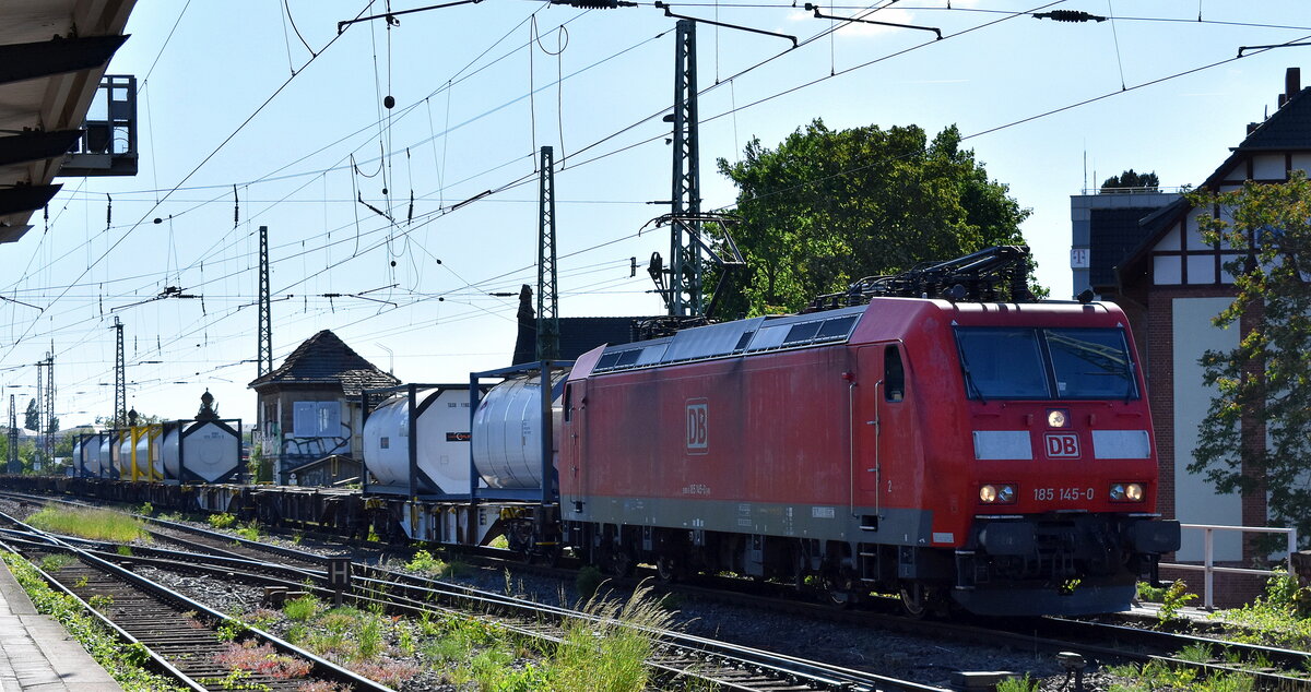 DB Cargo AG, Mainz mit ihrer  185 145-0  [NVR-Nummer: 91 80 6185 145-0 D-DB] und einem Tankcontainerzug am 14.05.24 Höhe Bahnhof Magdeburg-Neustadt.