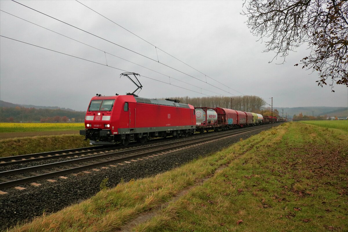 DB Cargo Bombardier Traxx 185 091-7 mit gemischten Güterzug in Retzbach Zellingen am 07.11.21