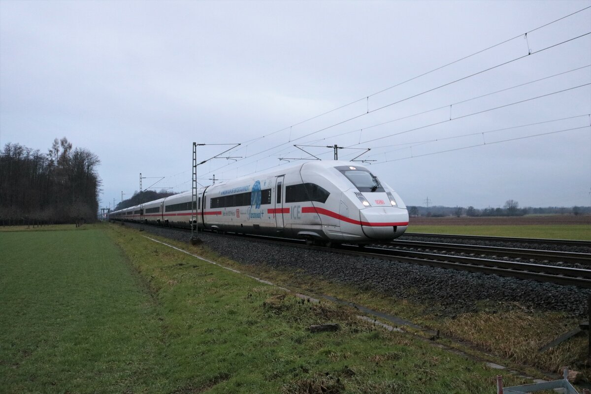 DB Fernverkehr ICE4 (412 019) mit Paramount Werbung als ICE596 in Langenselbold (Main Kinzig Kreis) am 05.02.23