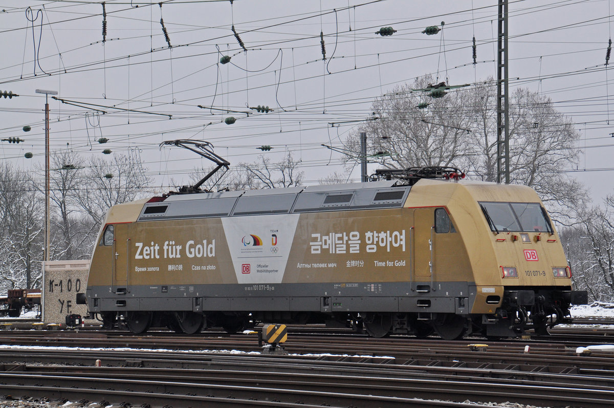 DB Lok 101 071-9 fährt solo beim Badischen Bahnhof ein. Die Aufnahme stammt vom 19.03.2018.
