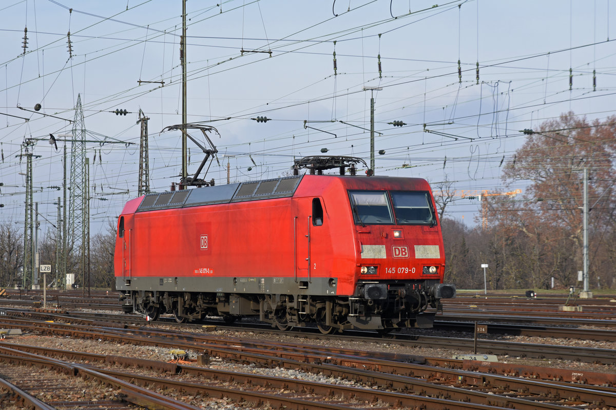 DB Lok 145 079-0 durchfährt den badischen Bahnhof. Die Aufnahme stammt vom 23.01.2019.