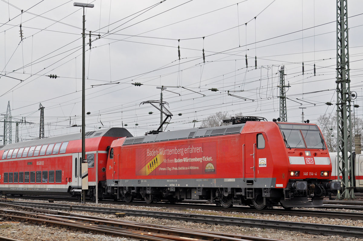 DB Lok 146 114-4 fährt beim Badischen Bahnhof ein. Die Aufnahme stammt vom 19.02.2018.