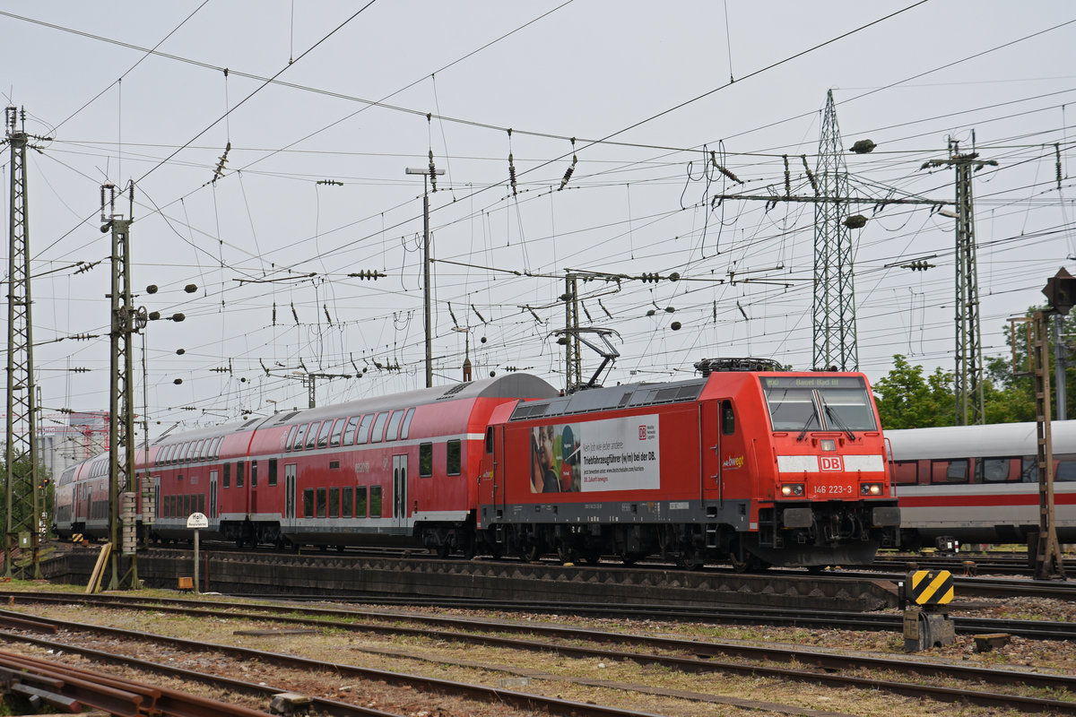 DB Lok 146 223-3 fährt beim badischen Bahnhof ein. Die Aufnahme stammt vom 22.05.2020.