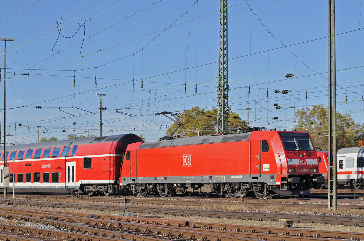 DB Lok 146 231-6 fährt beim Badischen Bahnhof ein. Die Aufnahme stammt vom 17.10.2017.