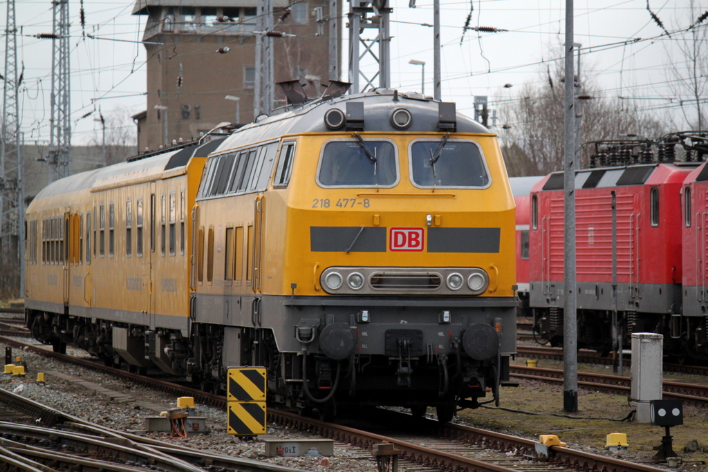 DB Netz 218 477-8 mit Schienenprfzug 1 abgestellt im Rostocker Hbf.16.02.2014 