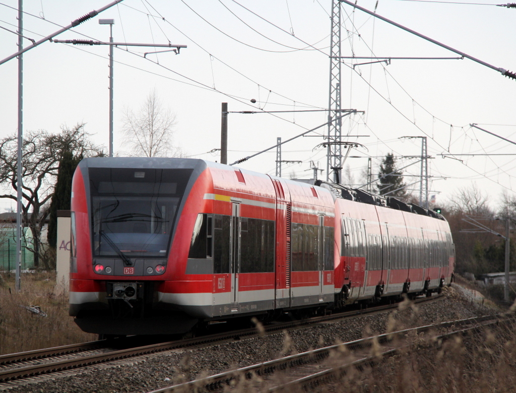 DB-Regio 646er und Hamster fuhren am 14.03.2014 von Rostock Hbf nach Berlin/Cottbus bei der Ausfahrt im Rostocker Hbf 