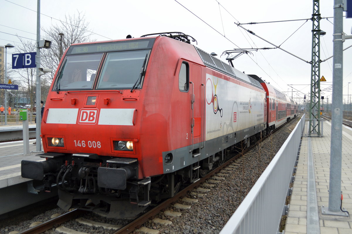 DB Regio AG mit  146 008  [NVR-Number: 91 80 6146 008-8 D-DB] Teilreklame  Damit Deutschland Vorne Bleibt  mit dem RE30 pausierend im Magdeburg Hbf. am 21.03.19
 