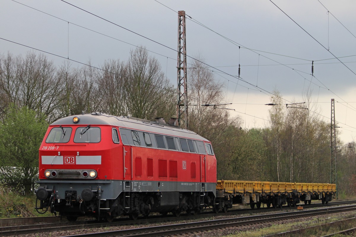 DB Services 218 208 am 24.3.14 mit zwei Res Wagen in Ratingen-Lintorf.