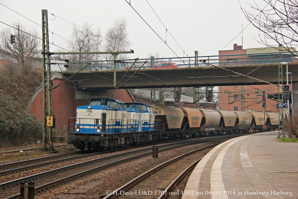 D&D 1702 (203 130) und D&D 1701 (203 110) mit einem Getreidezug am 04.03.2014 in Hamburg Harburg.