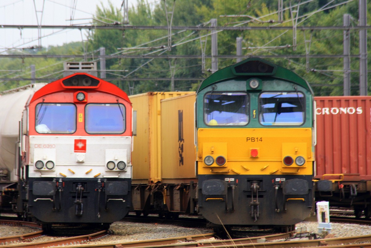 DE6310  Griet  von Crossrail und PB14 von Railtraxx warten nebeneinander auf ihre Abfahrt in Montzen-Gare(B) bei Sonne und Wolken am 22.9.2013.