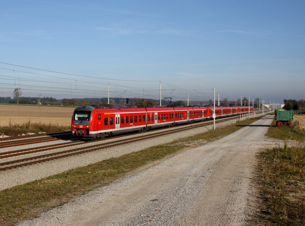 Der 440 024 und Zwei Weitere als RE nach Augsburg am 29.10.2011 unterwegs bei Hattenhofen.