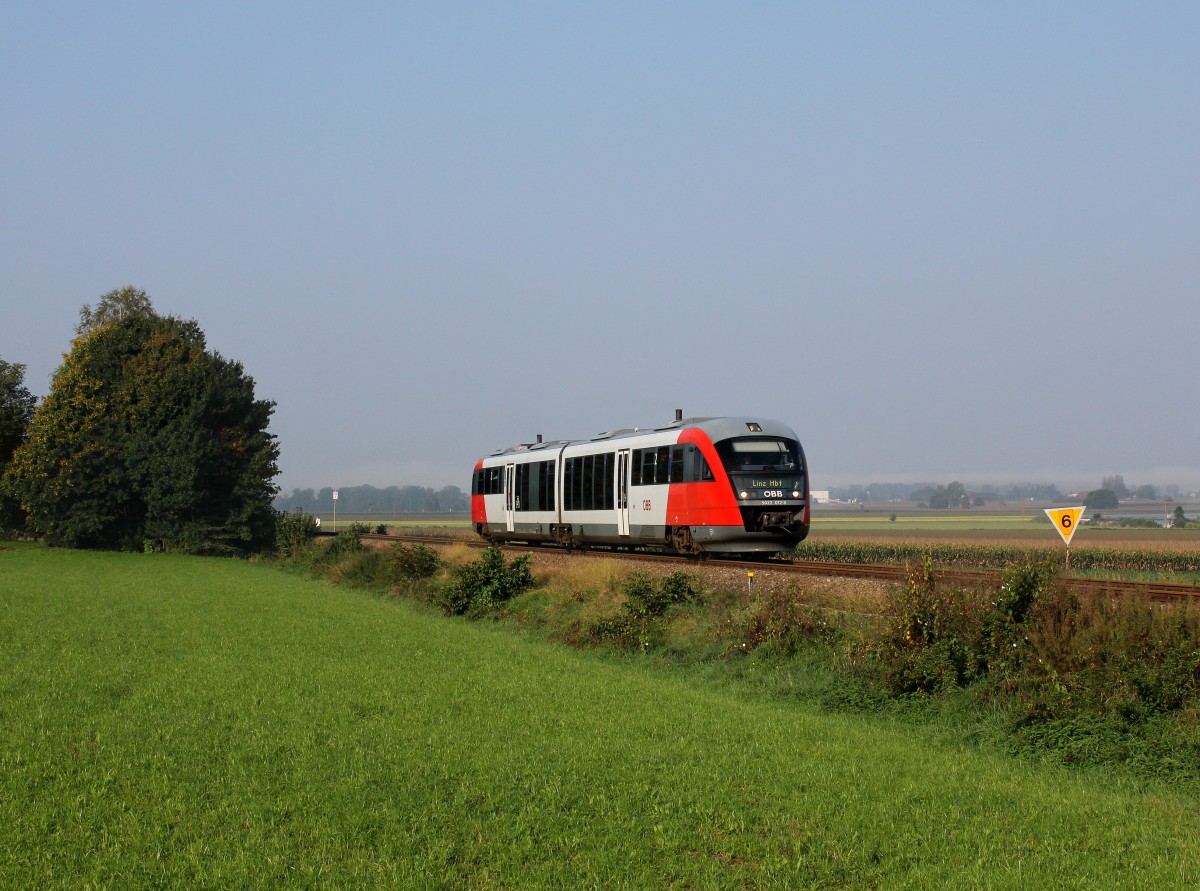 Der 5022 012 als REX nach Linz am 03.10.2014 unterwegs bei Geinberg.