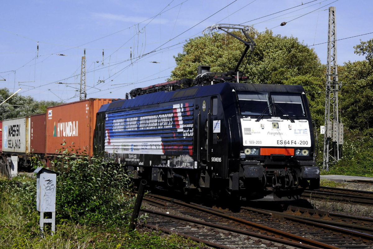 Der Chengdu-Tilburg-Rotterdam-Express mit DISPO-Lok 189 200 bei Grevenbroich, 11.9.18.