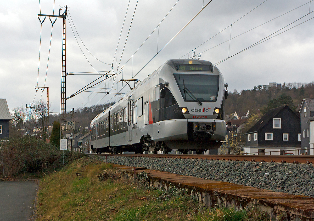 
Der ET 22007   Iserlohn  (2-teiliger Stadler Flirt) der Abellio Rail NRW am 15.03.2014 als RB 91  Ruhr-Sieg-Bahn   Hagen - Finnentrop - Kreuztal - Siegen, hier kurz vor dem  Bahnhof Siegen-Weidenau (früher Hüttental-Weidenau). 

Er fährt die KBS 440  Ruhr-Sieg-Strecke   Hagen - Siegen, hier noch auf der DB-Streckennummer 2800, ab Siegen-Weidenau bis Siegen dann DB-Streckennummer 2880.