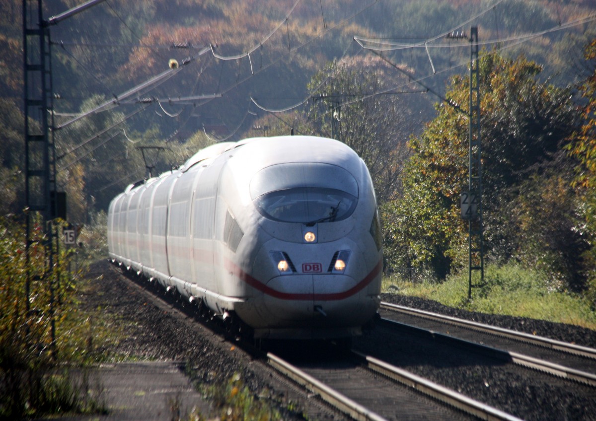 Der ICE3  aus Brüssel-Süd-Frankfurt am Main kommt durch Übach-Palenberg als Umleiter aus Richtung Aachen-Hbf,Aachen-Schanz,Aachen-West,Laurensberg,Richterich,Kohlscheid,Herzogenrath und fährt in Richtung Zweibrüggen,Frelenberg,Geilenkirchen,Süggerrath,Lindern,Brachelen,Hückelhoven-Baal,Baal,Erkelenz,Herrath,Beckrath,Wickrath,Rheydt. 
Bei schönem Novemberwetter am Mittag vom 2.11.2014.