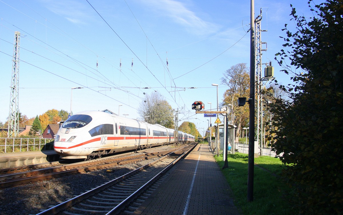 Der ICE3 aus Frankfurt am Main-Brüssel-Süd kommt durch Kohlscheid als Umleiter aus Richtung Neuss,Herzogenrath und fährt in Richtung Aachen-West,Hbf und fährt die Kohlscheider-Rampe hoch nach Aachen-West. 
Bei schönem Novemberwetter am Vormittag vom 2.11.2014.