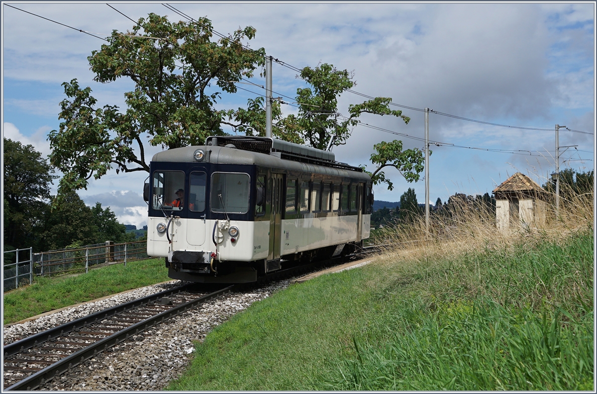 Der MOB Be 4/4 1006 (ex Bipperlisi) als Regionalzug 2331 bei der Haltstelle Châtelard VD. 

12. August 2019