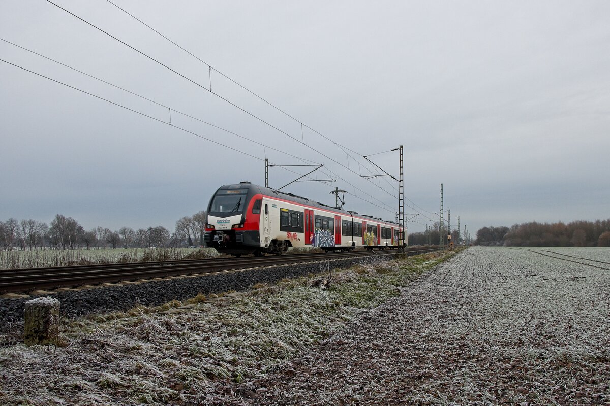 Der stark beschmierte ET 4.31 / 3427 009 A der Eurobahn als Triebfahrzeugfahrt in Kamen-Westick (23.12.2021)