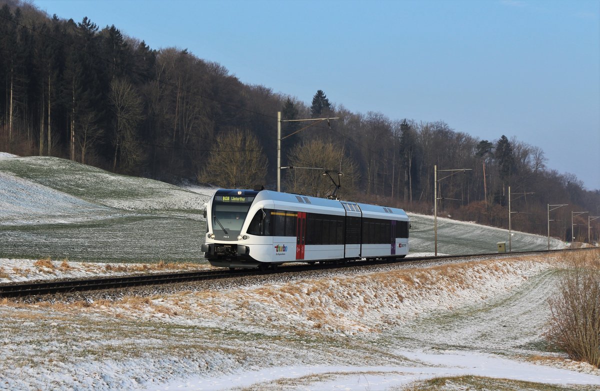 Der Thurbo GTW RABe 526 719-0 unterwegs als S41 von Bülach nach Winterthur zwischen Embrach-Rorbas und Pfungen.

Freitag, 2. März 2018