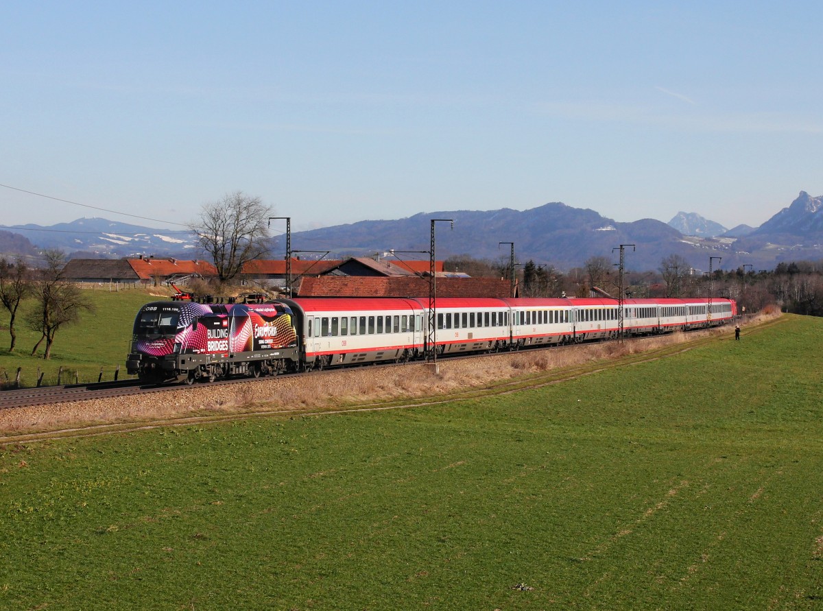 Die 1116 180 mit einem EC am 12.02.2016 unterwegs bei Straß.