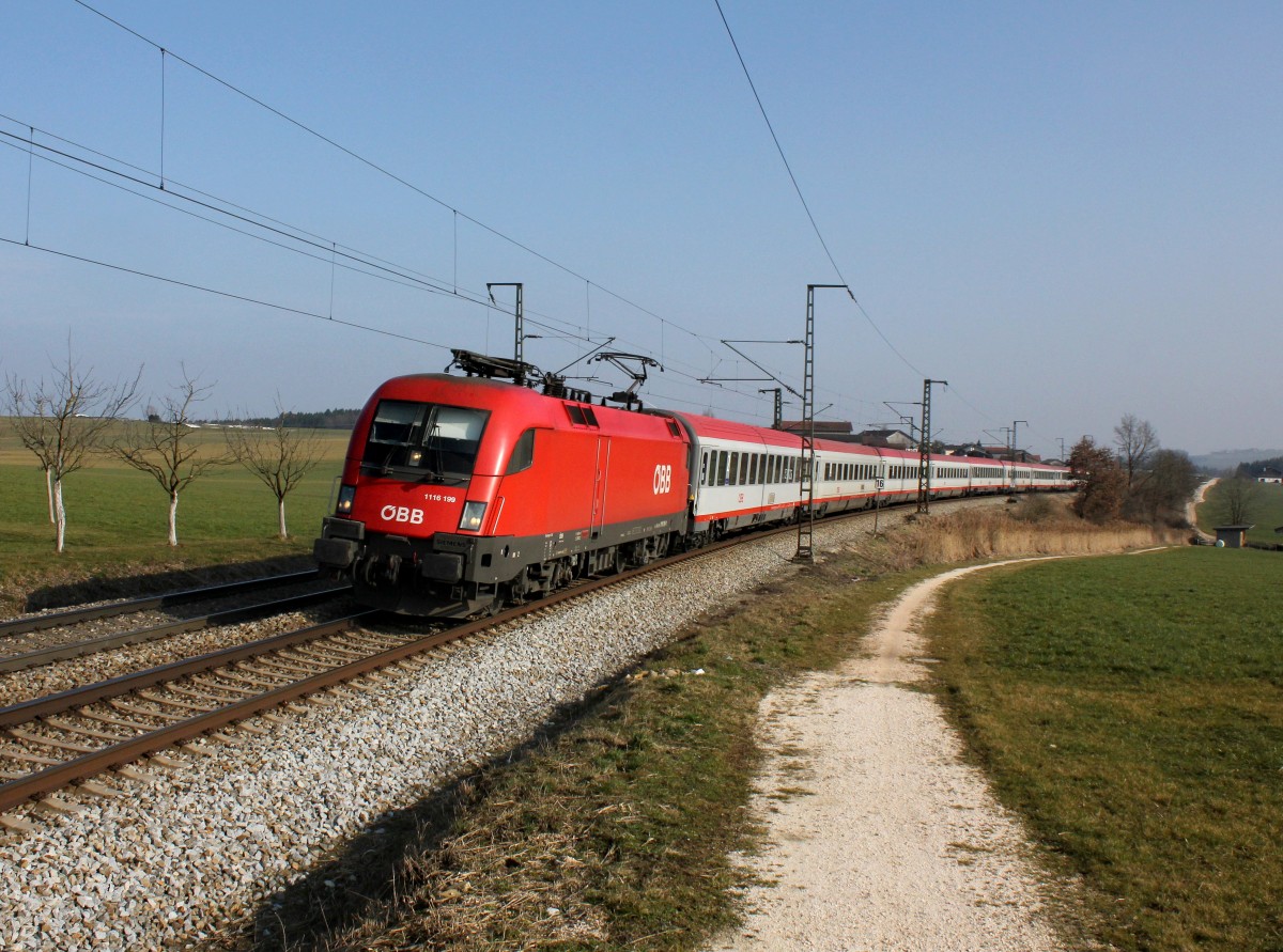 Die 1116 199 mit einem OIC am 07.03.2014 unterwegs bei Teisendorf.