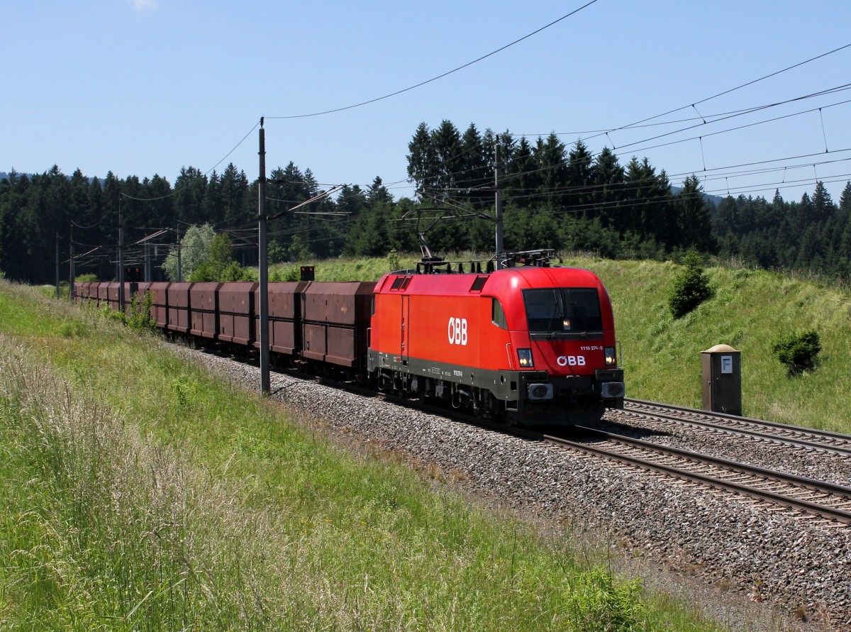 Die 1116 274 mit einem Erzzug am 16.06.2012 unterwegs bei Pöndorf.