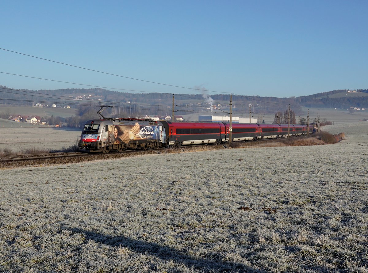 Die 1216 019 mit einem RJ am 02.01.2020 unterwegs bei Weng.