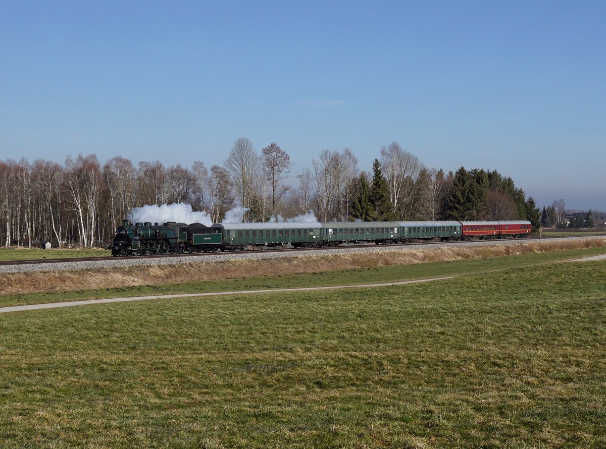 Die 18 3673 mit einem Sonderzug nach Lindau am 24.03.2018 unterwegs bei Buchloe.