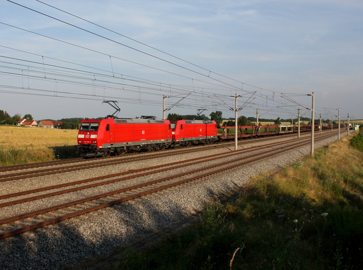 Die 185 298 und die 185 155 mit einem Gterzug am 20.07.2013 unterwegs bei Unterweilbach.