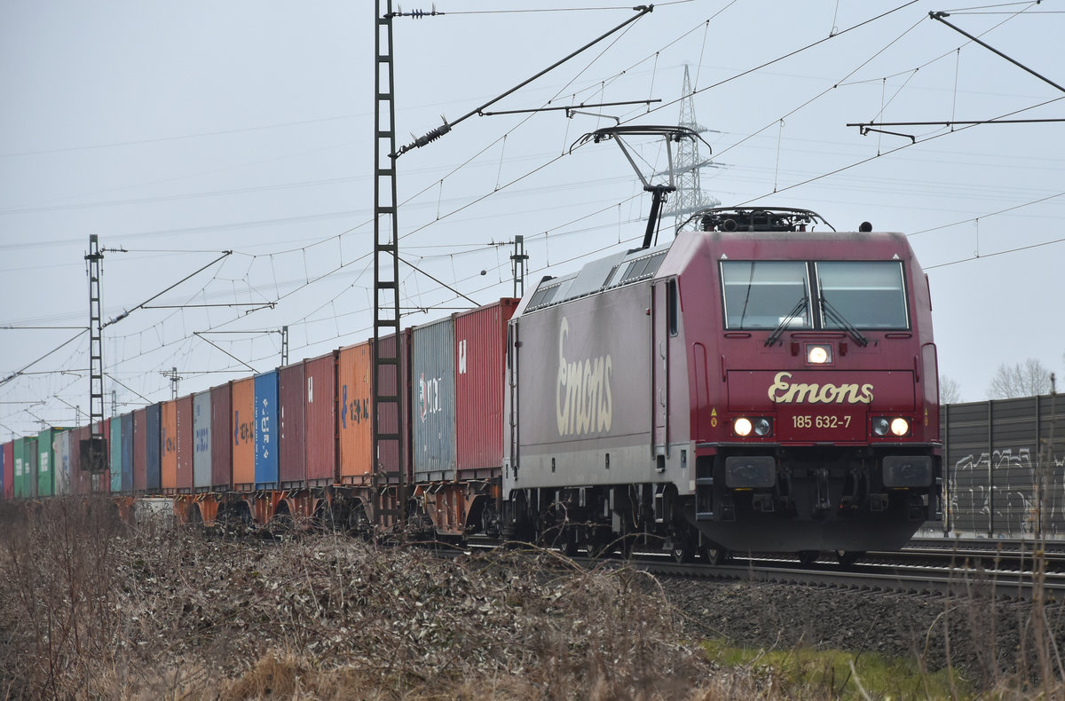 Die 185 632-7 nun im neuen Farbkleid der Emons Rail Cargo unterwegs, kommend aus Lüneburg. Höhe Bardowick, 26.03.2018