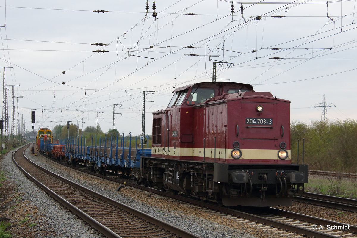 Die 204 703 der MTEG mit einen Bauzug bei Großkorbetha unterwegs am 17.04.2016