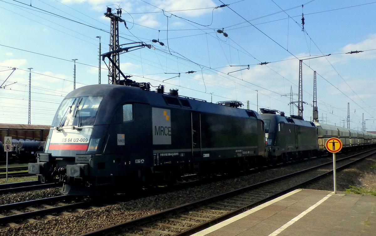 Die beiden MRCE-Dispo Tauren ES 64 U2-009(182 509-0) und ES 64 U2-099(182 599-1) zogen am 30.03.19 einen langen Güterzug aus GATX Falns-Wagen, die vermutlich mit Kohle beladen waren, am HP Duisburg-Bissingheim vorbei.